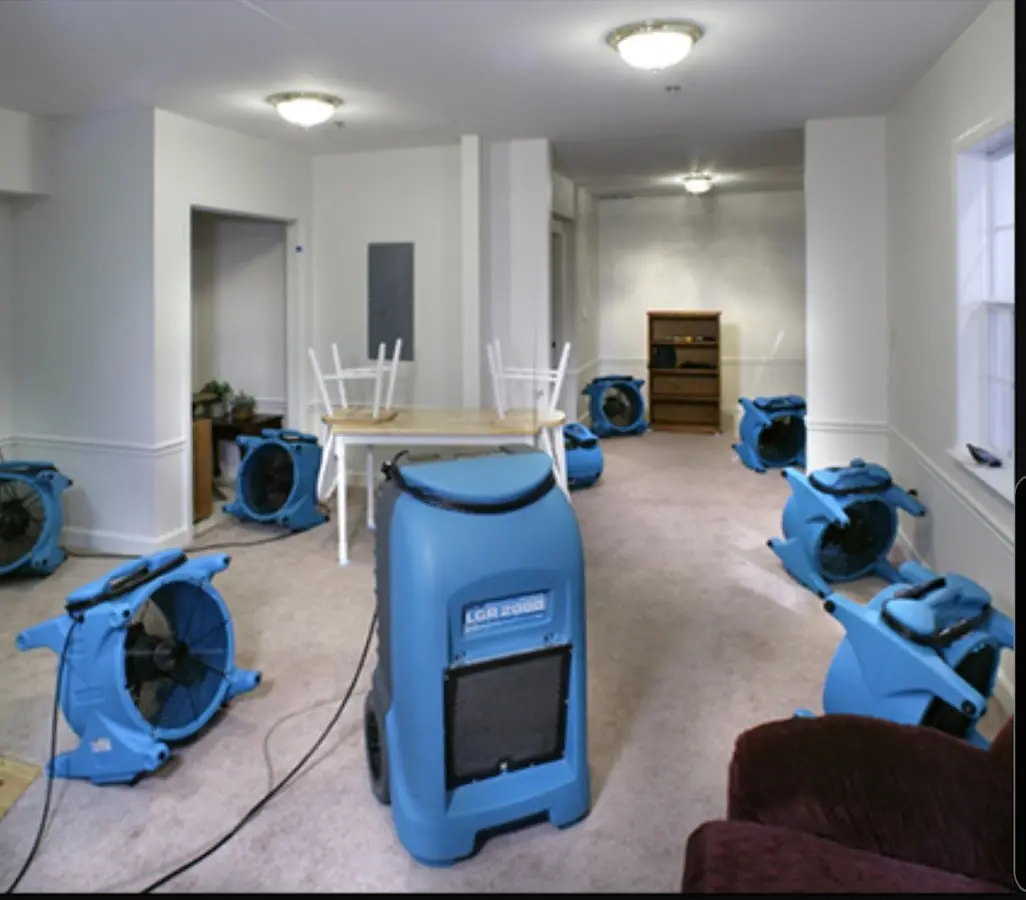 Air movers and dehumidifier setup for Water Damage Restoration in Doraville